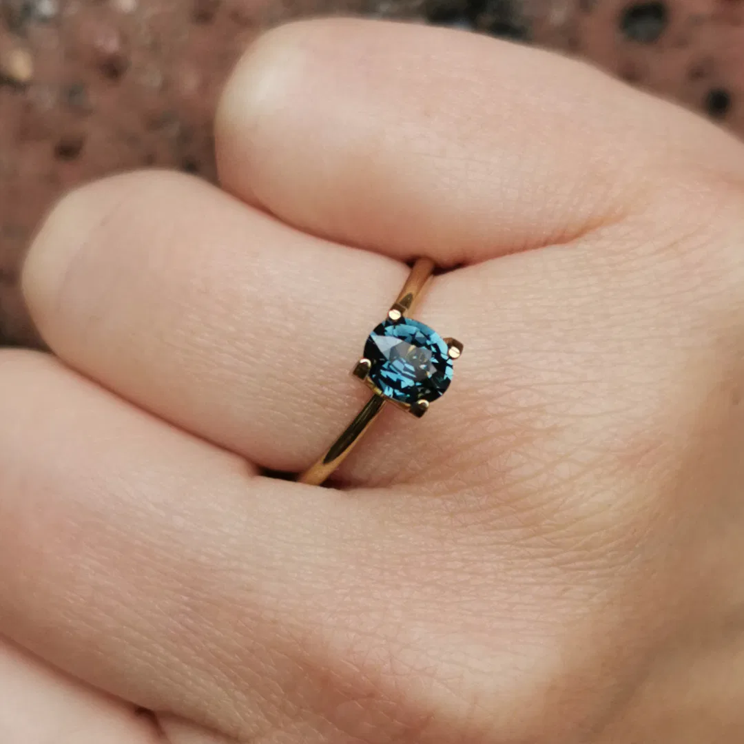 engagement ring with a sapphire and diamond